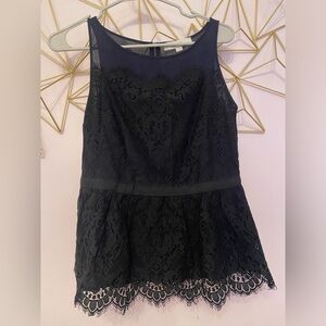 Loft size 4 top. Blue with black lace and zipper in back.